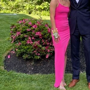 Pink one shoulder dress.
